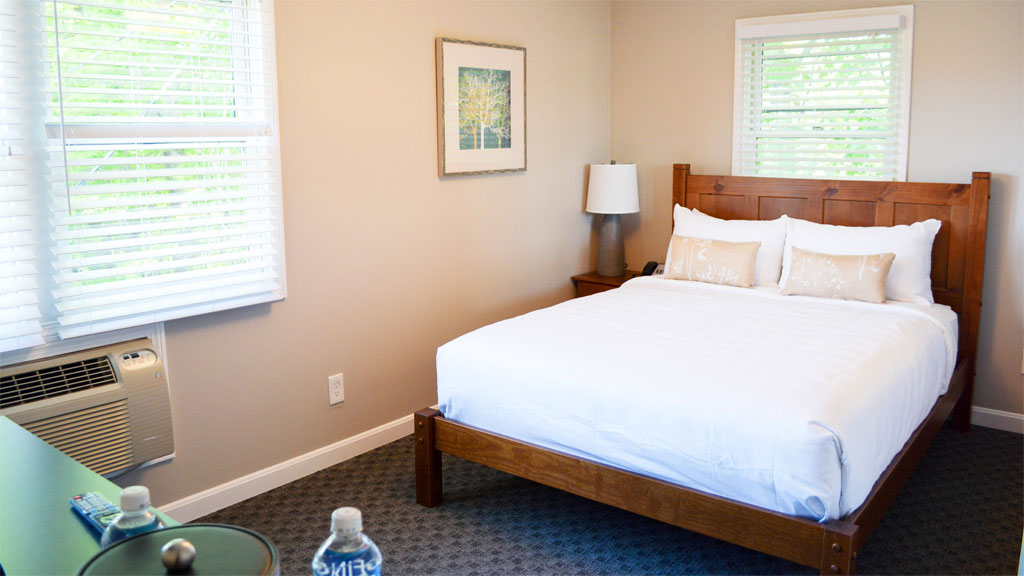 On the second floor of the Cottage, these hotel rooms offer a blend of comfort and value