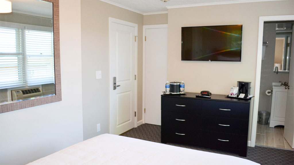 Upstairs rooms feature recent renovations and each is equipped with a flat screen TV